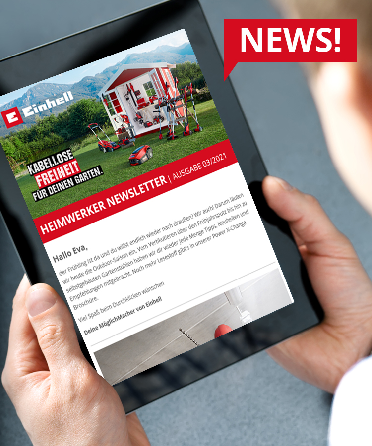 Picture of a person looking at the Einhell Newsletter on a tablet.