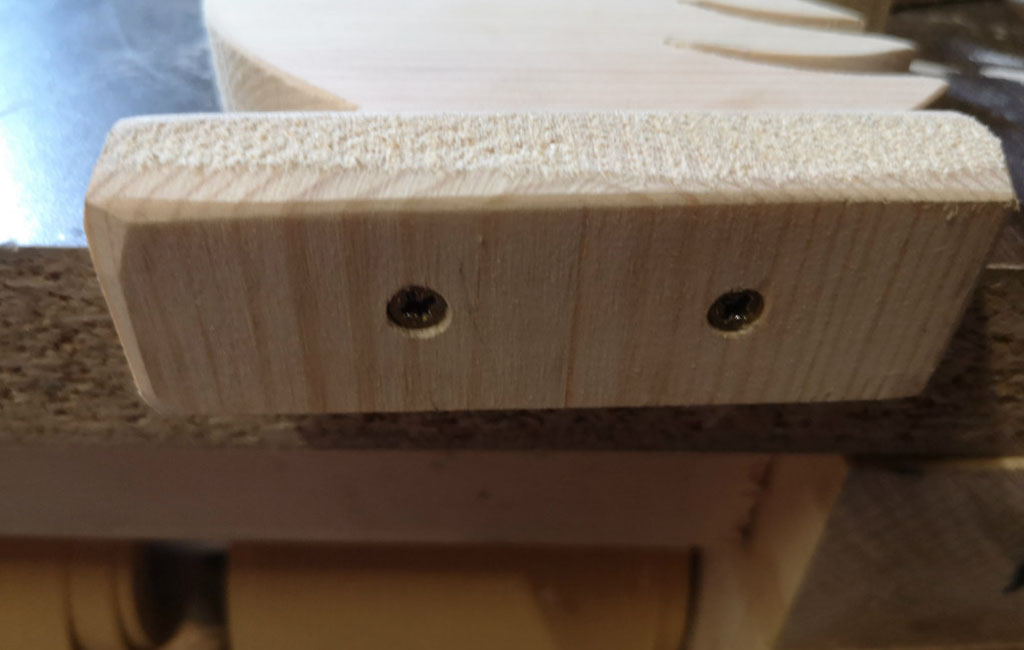 Wooden block with drilled holes for assembling a DIY decoration