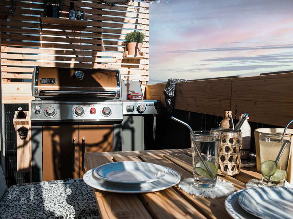 covered table and grill on the balcony