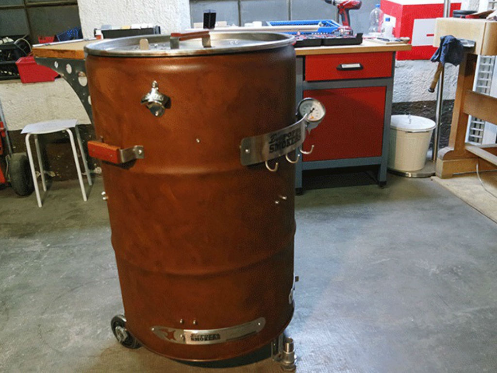 brown bbq smoker stands in workshop