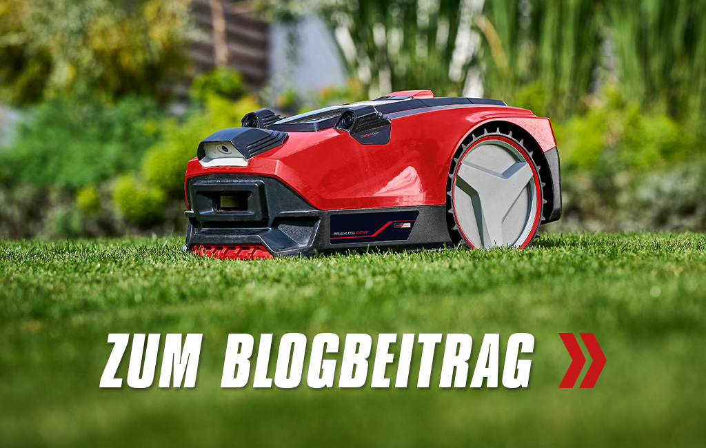 Nahaufnamhe eines Rasenmähroboters von Einhell. Text im Vordergrund: Zum Blogbeitrag