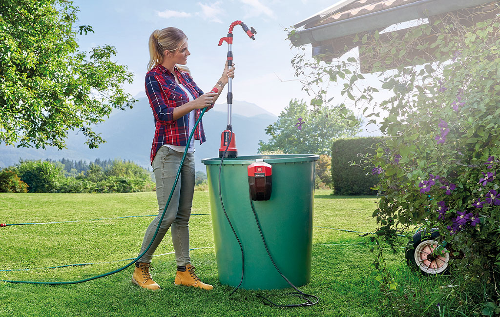 A woman deinstalling the water pump.