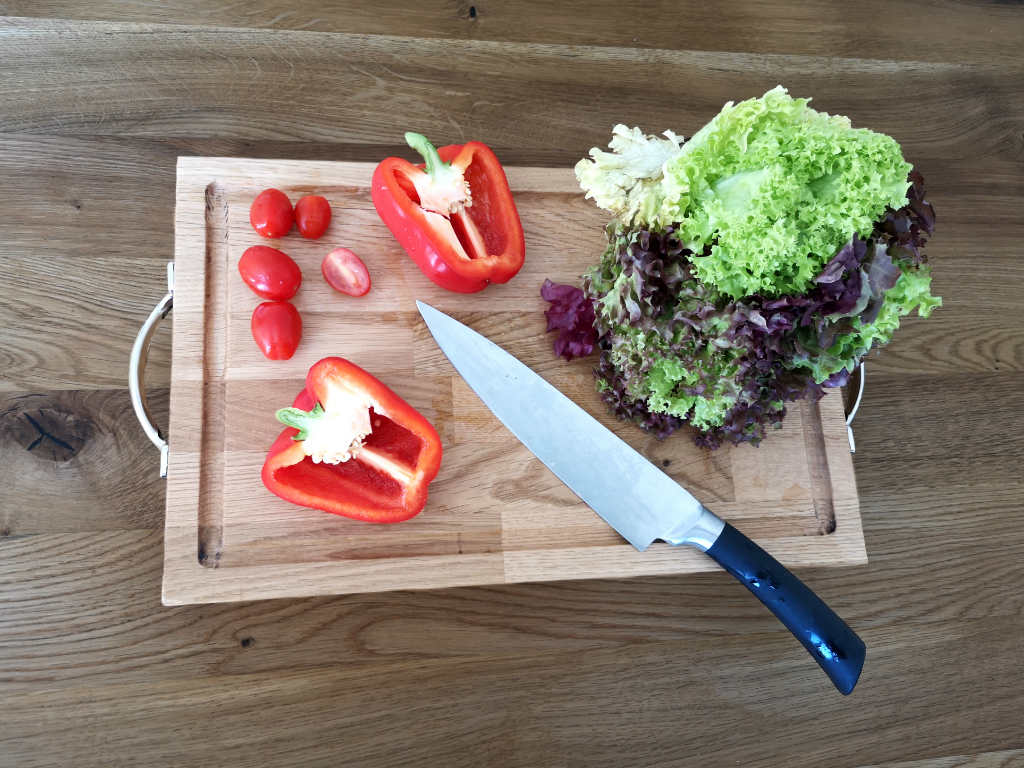cutting board with vegetables