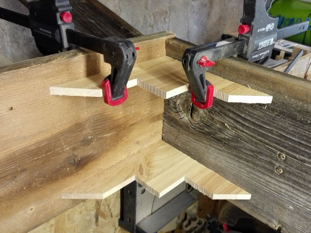 wooden board is clamped together