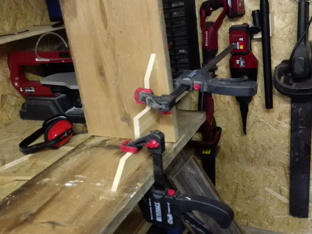 wooden board is clamped together