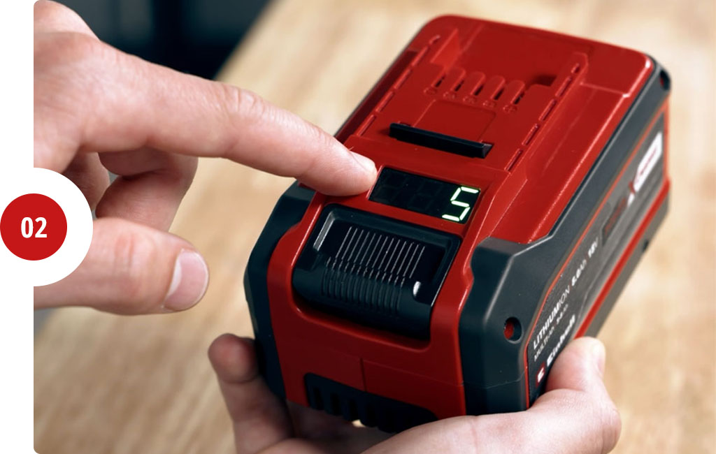 Someone is pushing the button on the Einhell Multi-Ah battery