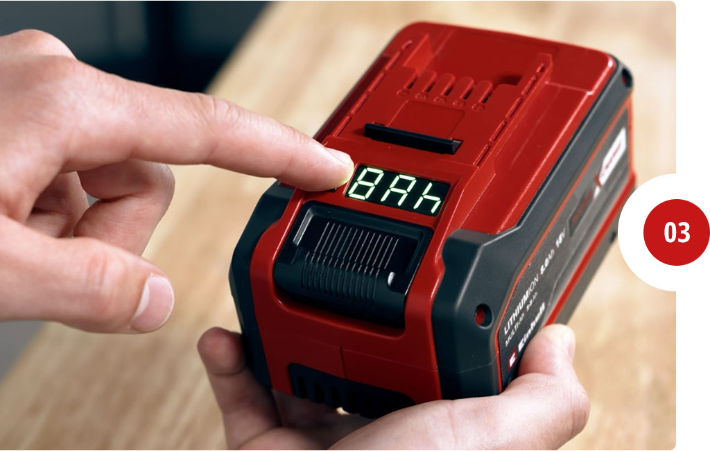 Someone is pushing the button on the Einhell Multi-Ah battery