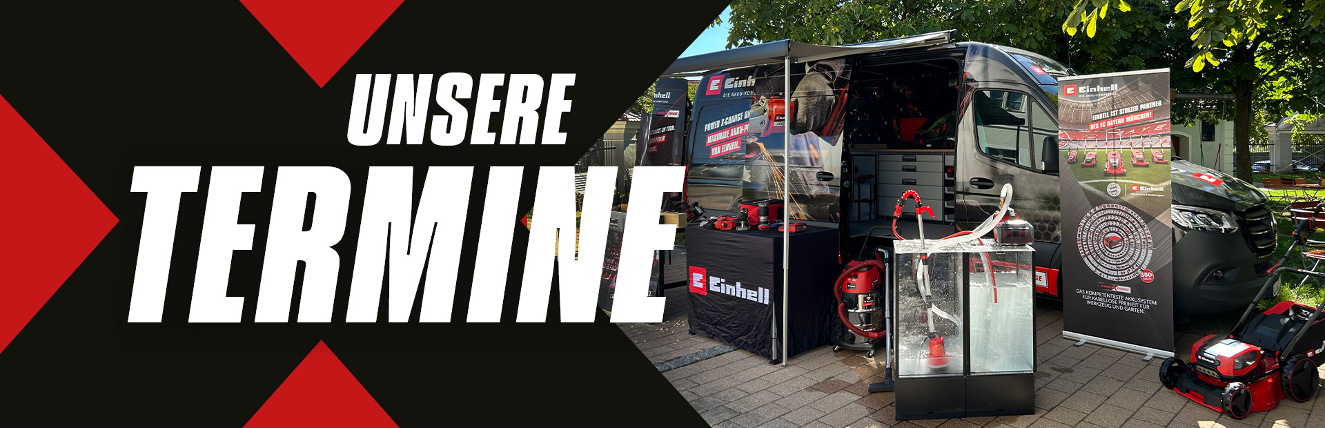 Werbetafel mit dem Text "Unsere Termine", daneben ein ausgestellter Einhell-Wagen mit Produkten und Werbematerialien.