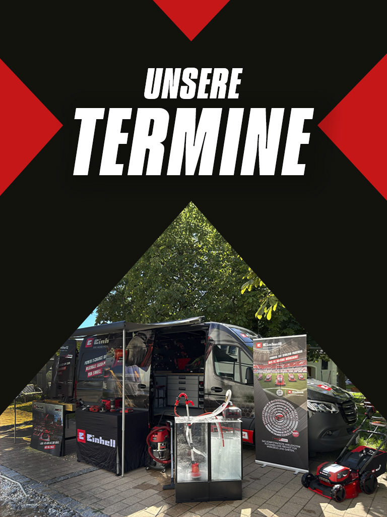 Werbetafel mit dem Text "Unsere Termine", daneben ein ausgestellter Einhell-Wagen mit Produkten und Werbematerialien.