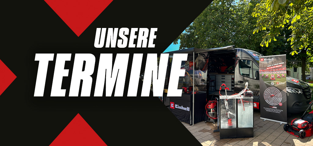 Werbetafel mit dem Text "Unsere Termine", daneben ein ausgestellter Einhell-Wagen mit Produkten und Werbematerialien.