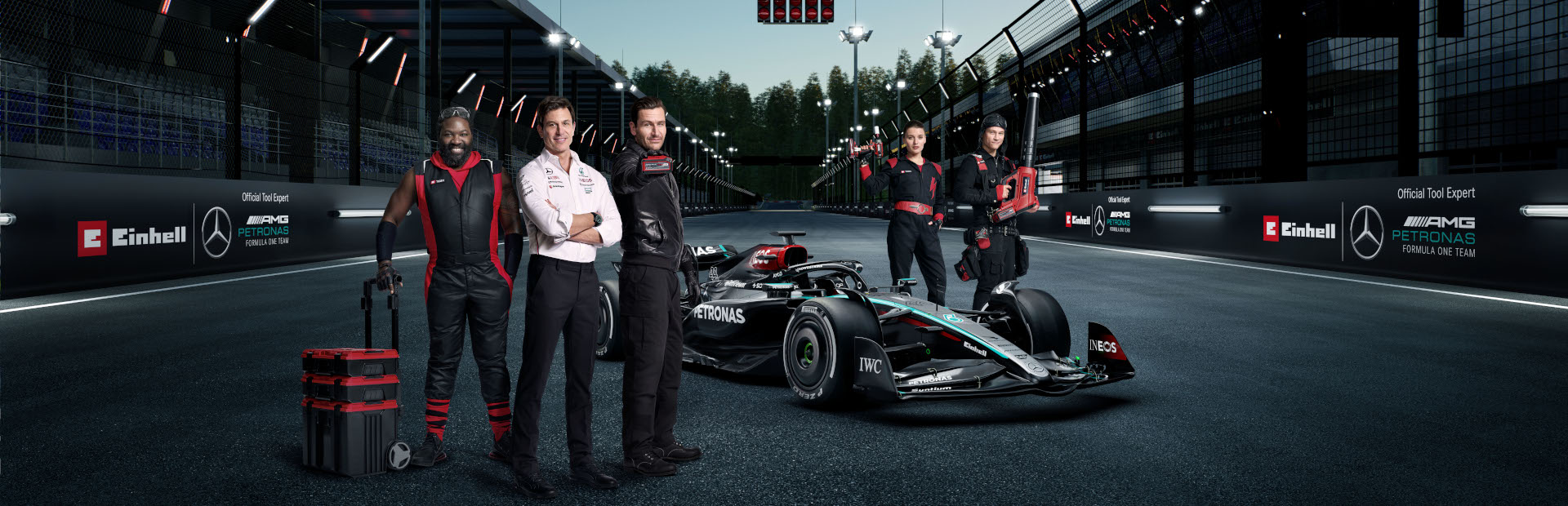 E team members alongside the Formula 1 team