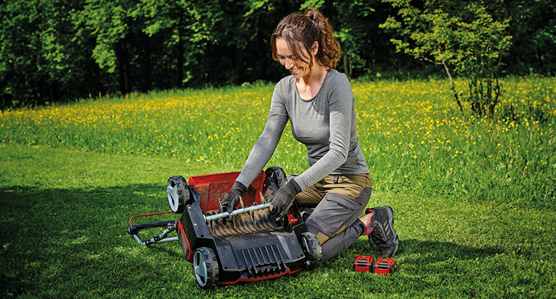 Scarifier attachment for ride on outlet mower