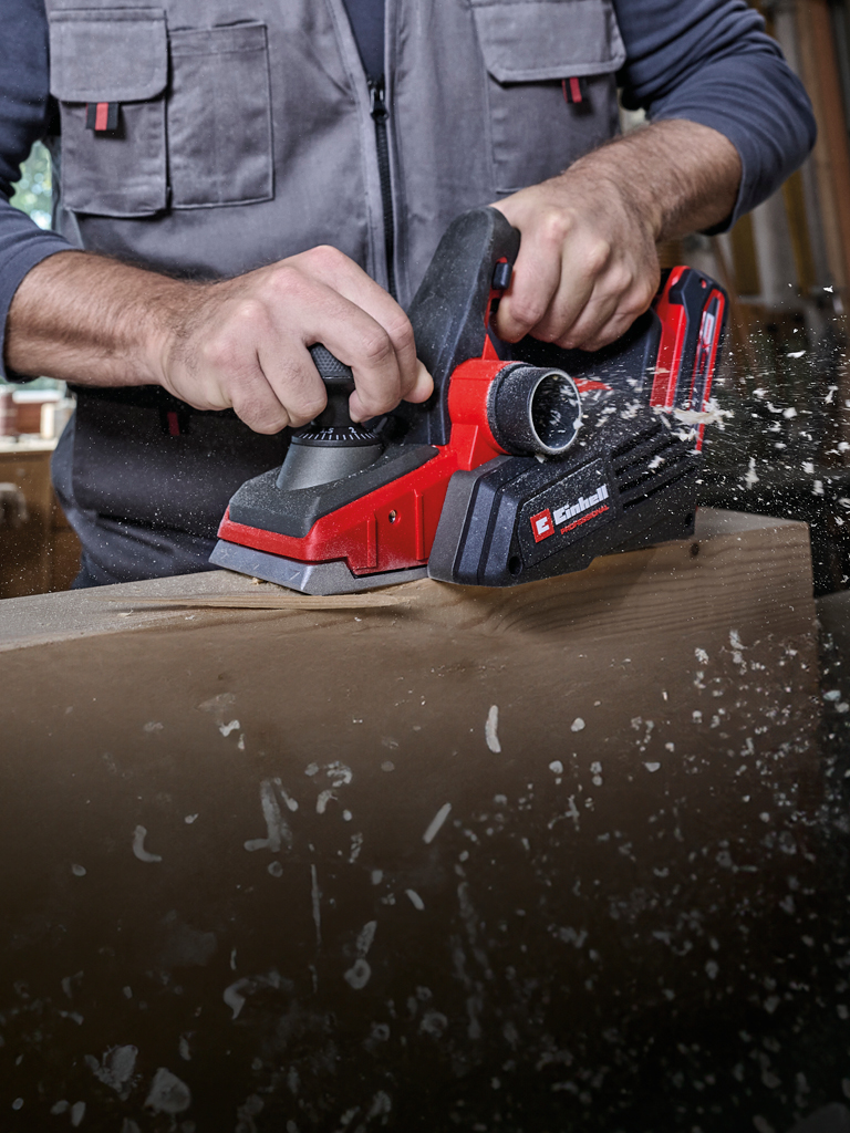 A man using a Power-X-Change sander