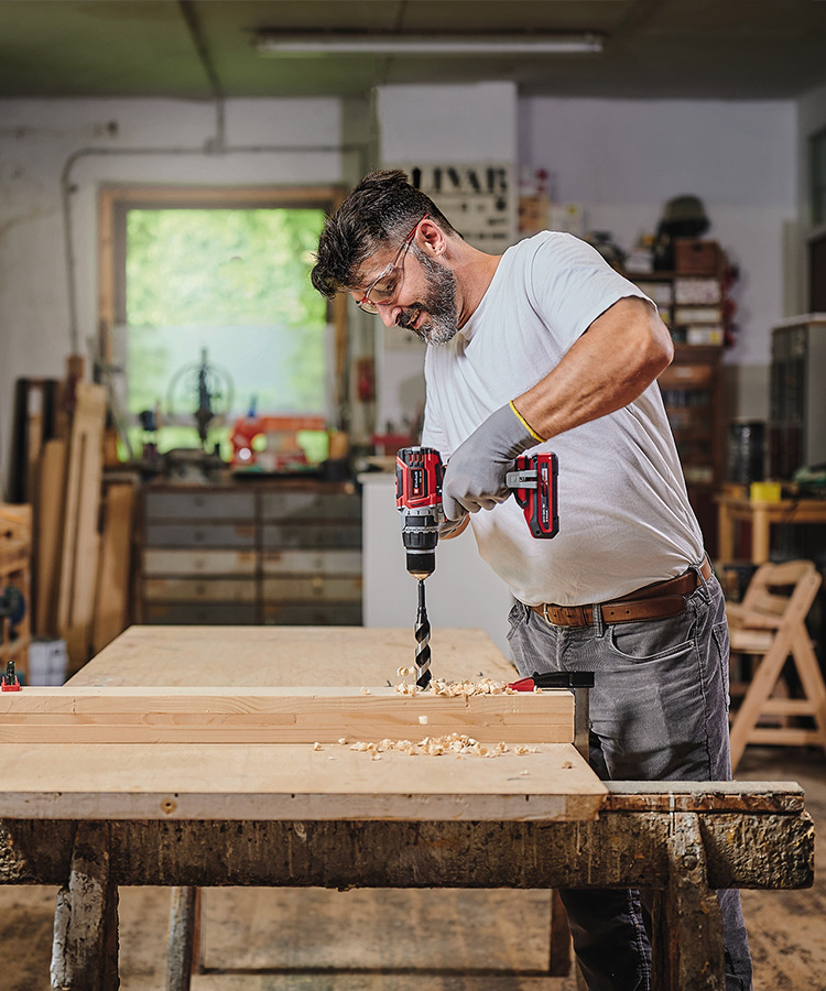 man working with a cordless screwdriver