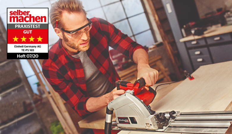 man working with a plunge cut saw