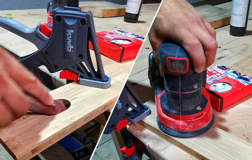 Holz wird zunächst von Hand und dann mit einem roten Exzenterschleifer geschliffen; eine Schraubzwinge fixiert das Werkstück.